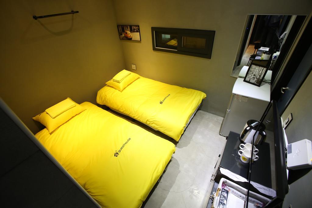 24 Guesthouse Garosugil - Gangnam Сеул Номер фото